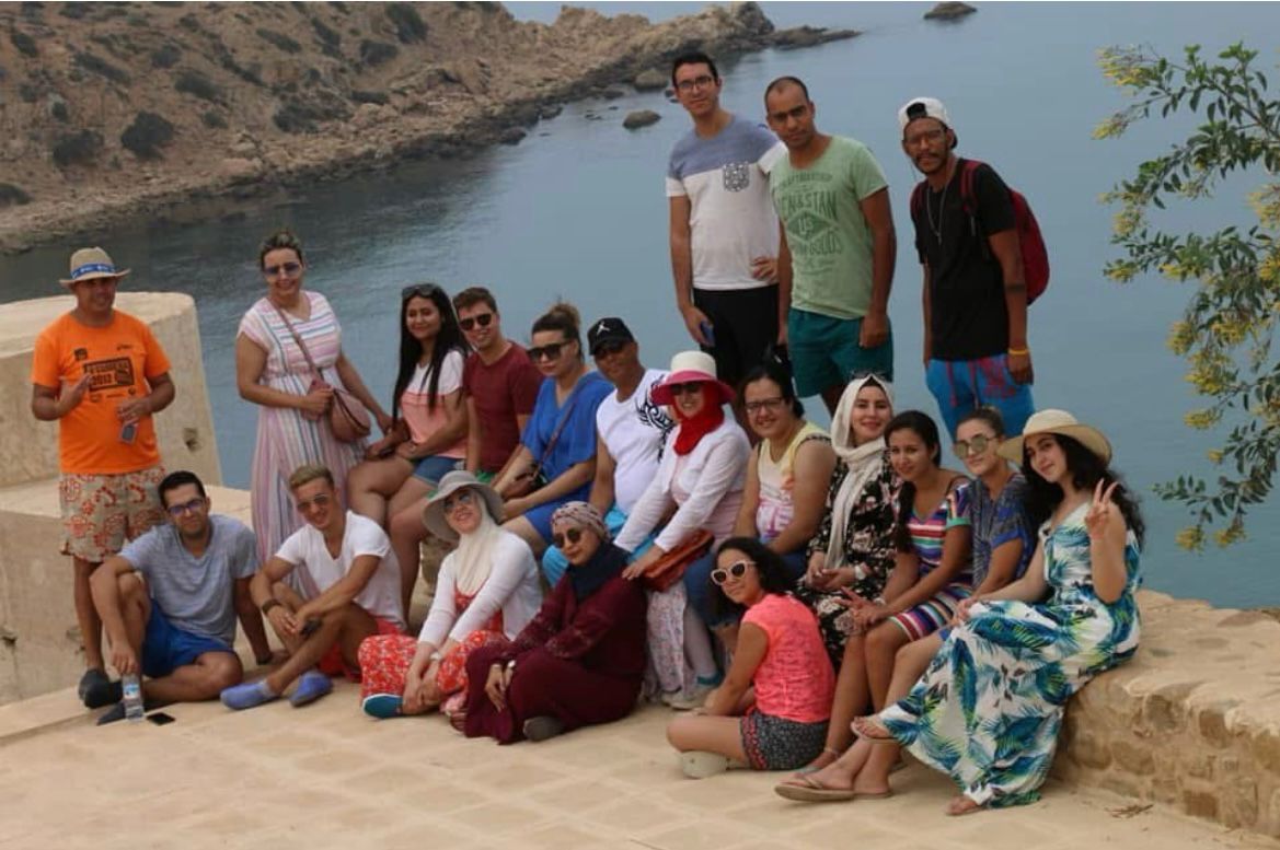 مجموعة من المسافرين على الساحل خلال رحلة Ready To Go Voyage